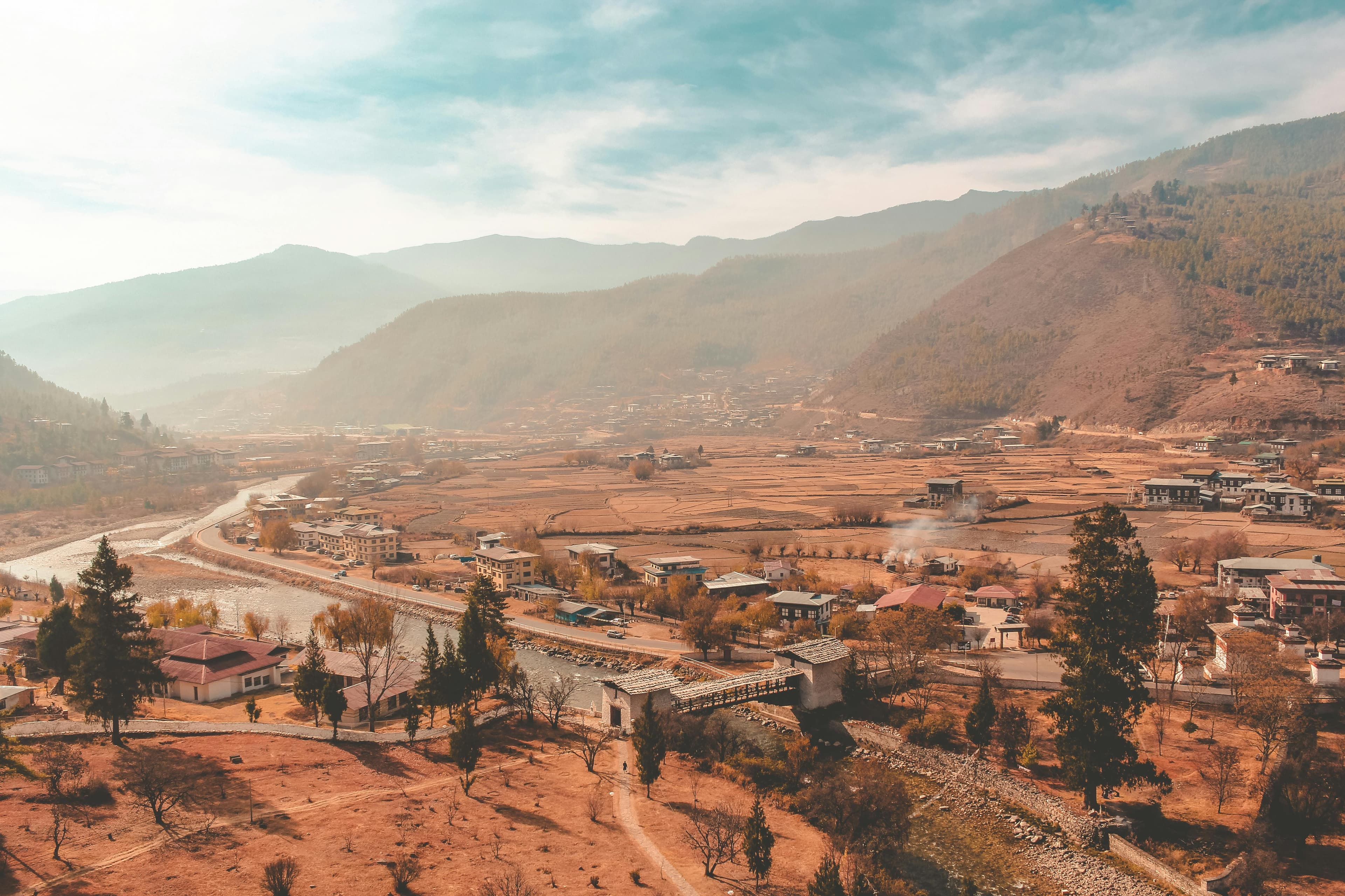 Thimphu city nestled along Wang Chhu beneath forested hills