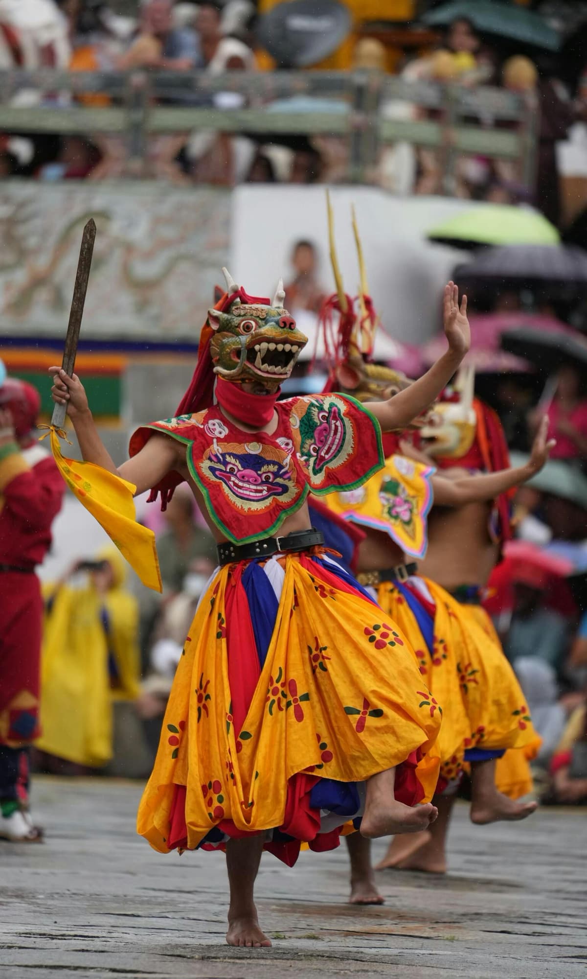 Bhutanese festival dancers in masks